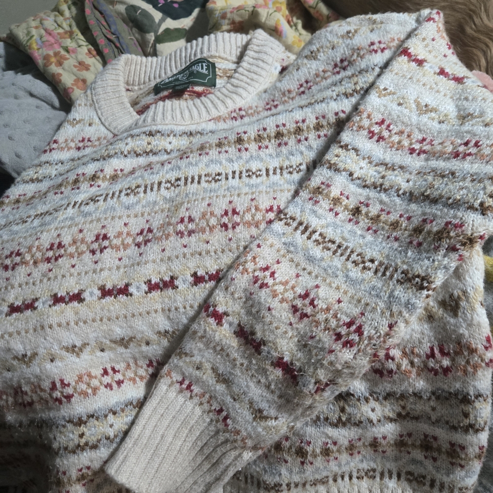 American Eagle Cream Fair Isle Wool-Blend Pullover with Red and Tan Accents.